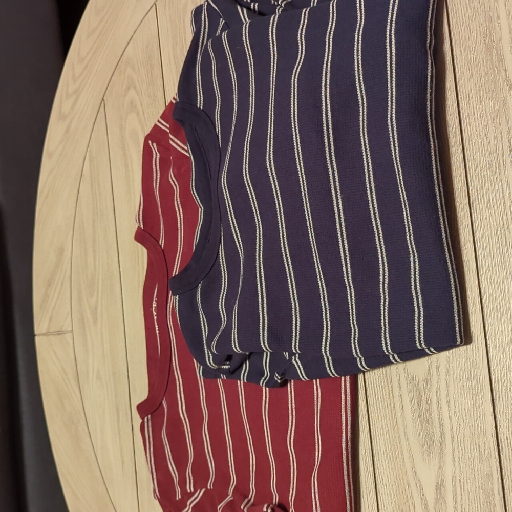 Two long sleeve Henley shirts